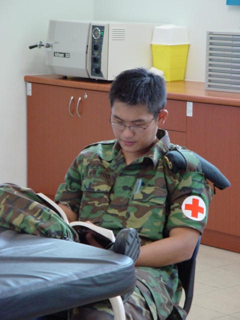 'Kenneth doing some reading in the Treatment Room. Hmmm...is that porn I see there, Kenneth?'